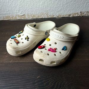 White Crocs With Charms